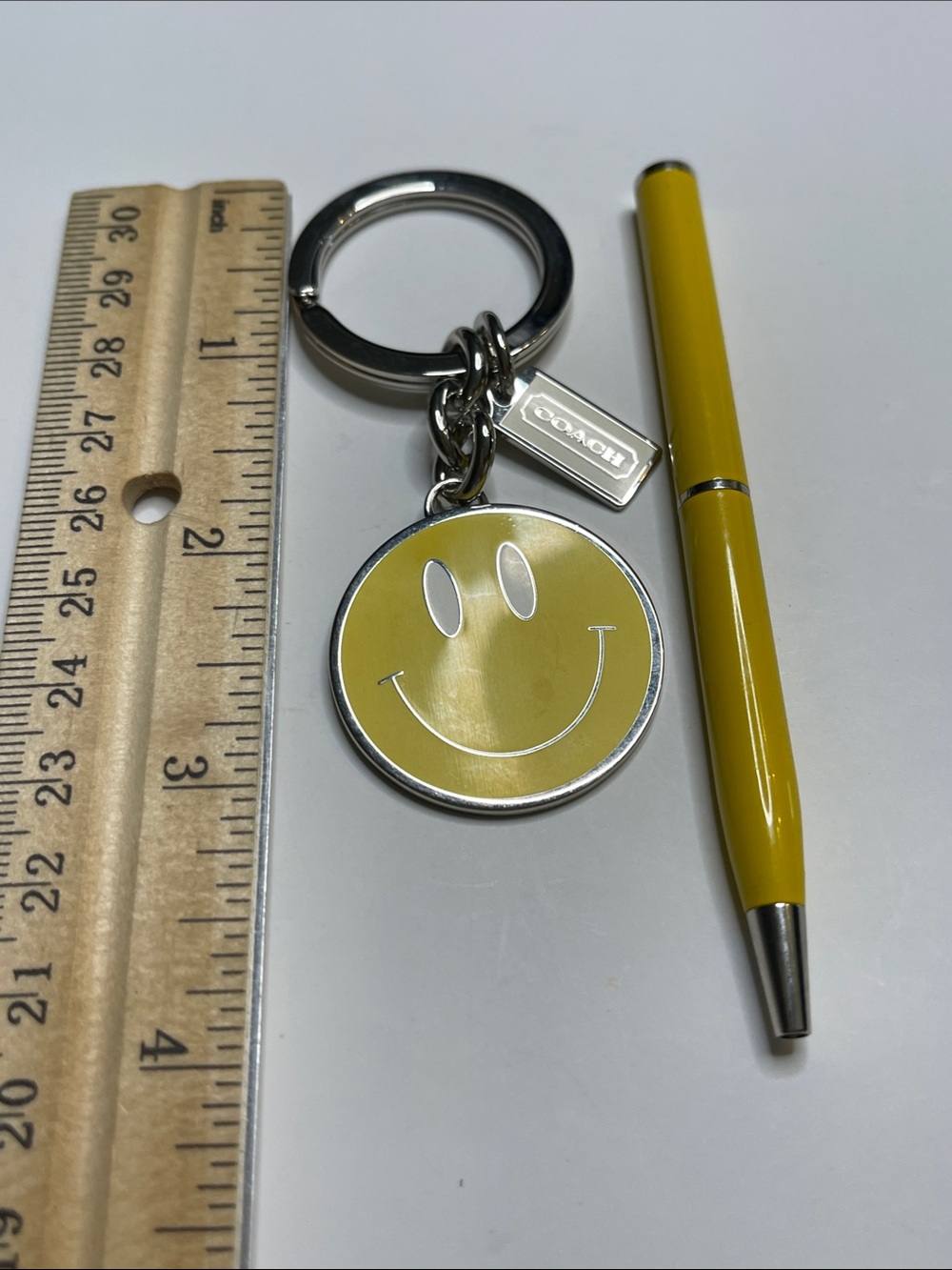COACH Yellow Smiley Face Keychain and Coach Pen - Picture 3 of 5